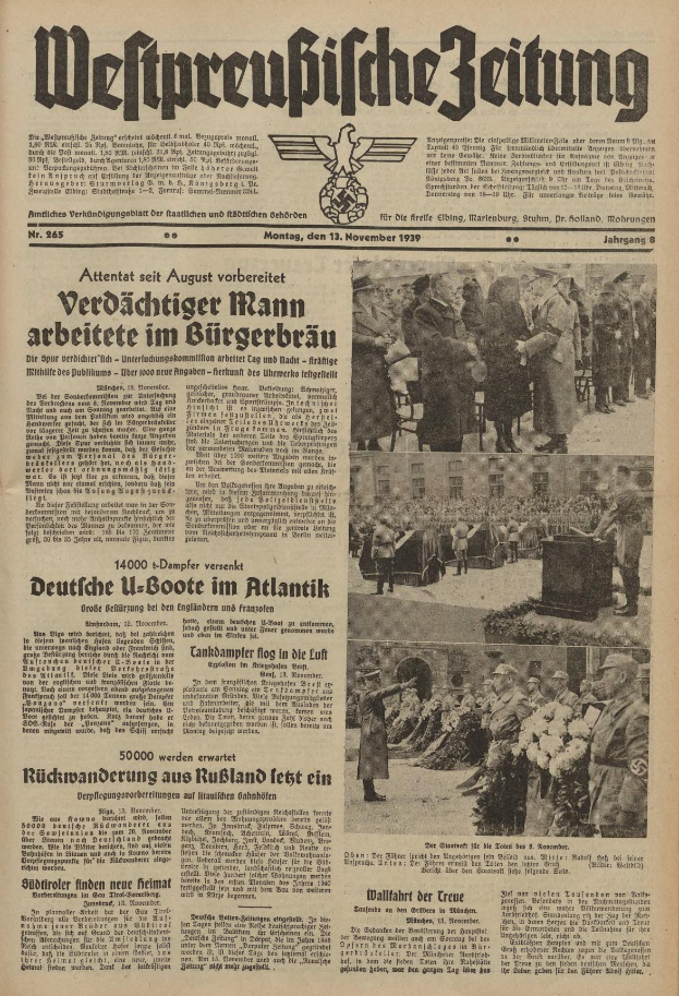 Schwarze Titelseite einer deutschen Zeitung vom 13. November 1939 mit der Überschrift "Weitpreubliche Zeitung", die eine Gruppe von Menschen in traditioneller deutscher Tracht in einer feierlichen Szenerie zeigt.